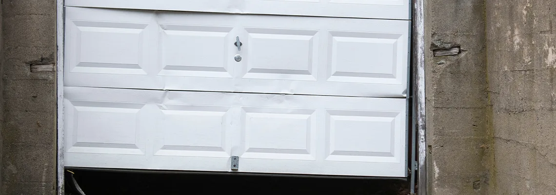 Garage Door Got Hit By A Car Dent Removal in Port Charlotte, FL